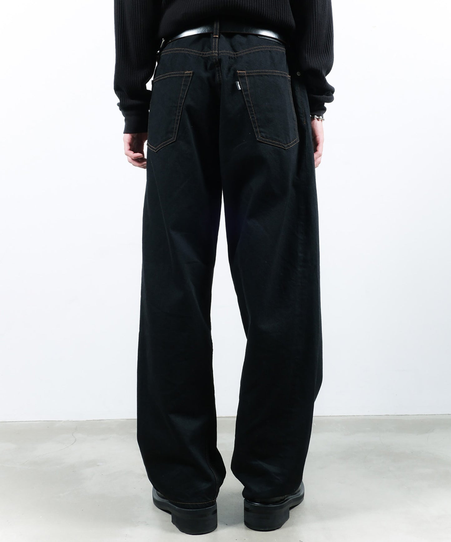 TWIST DENIM PANTS