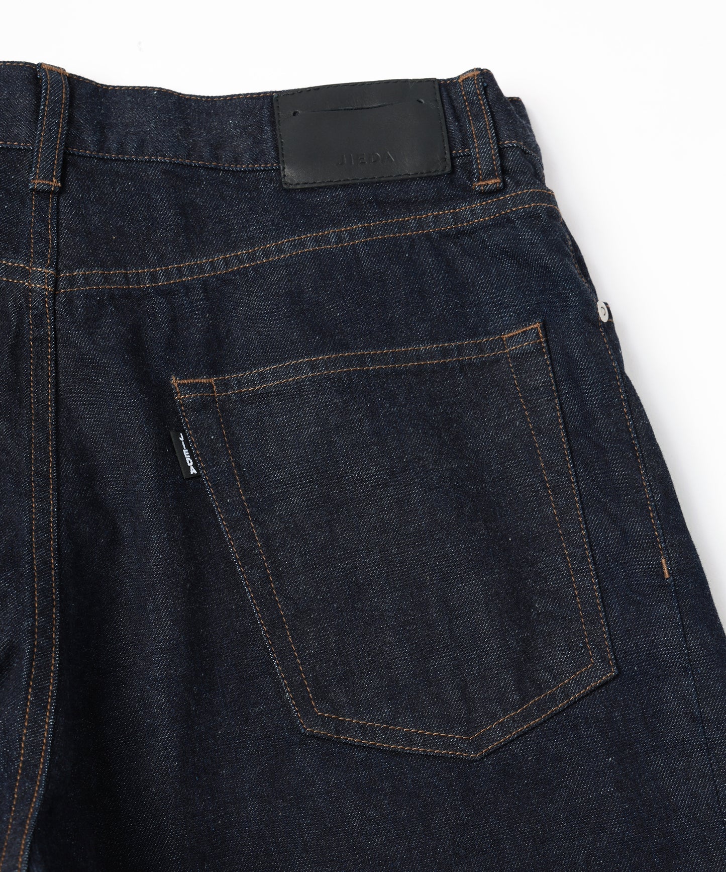 TWIST DENIM PANTS