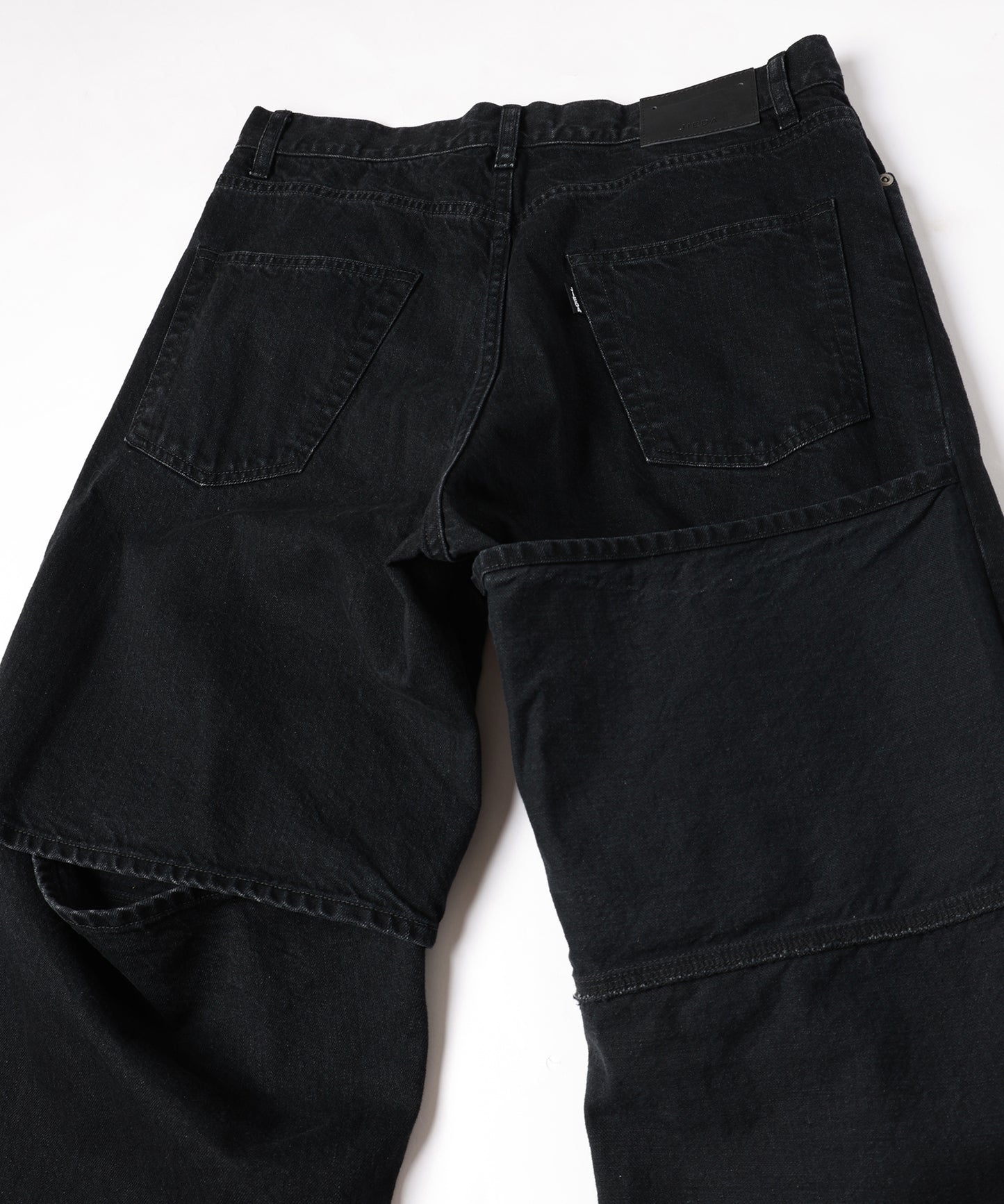KNEE HIGH LAYERED COATED DENIM