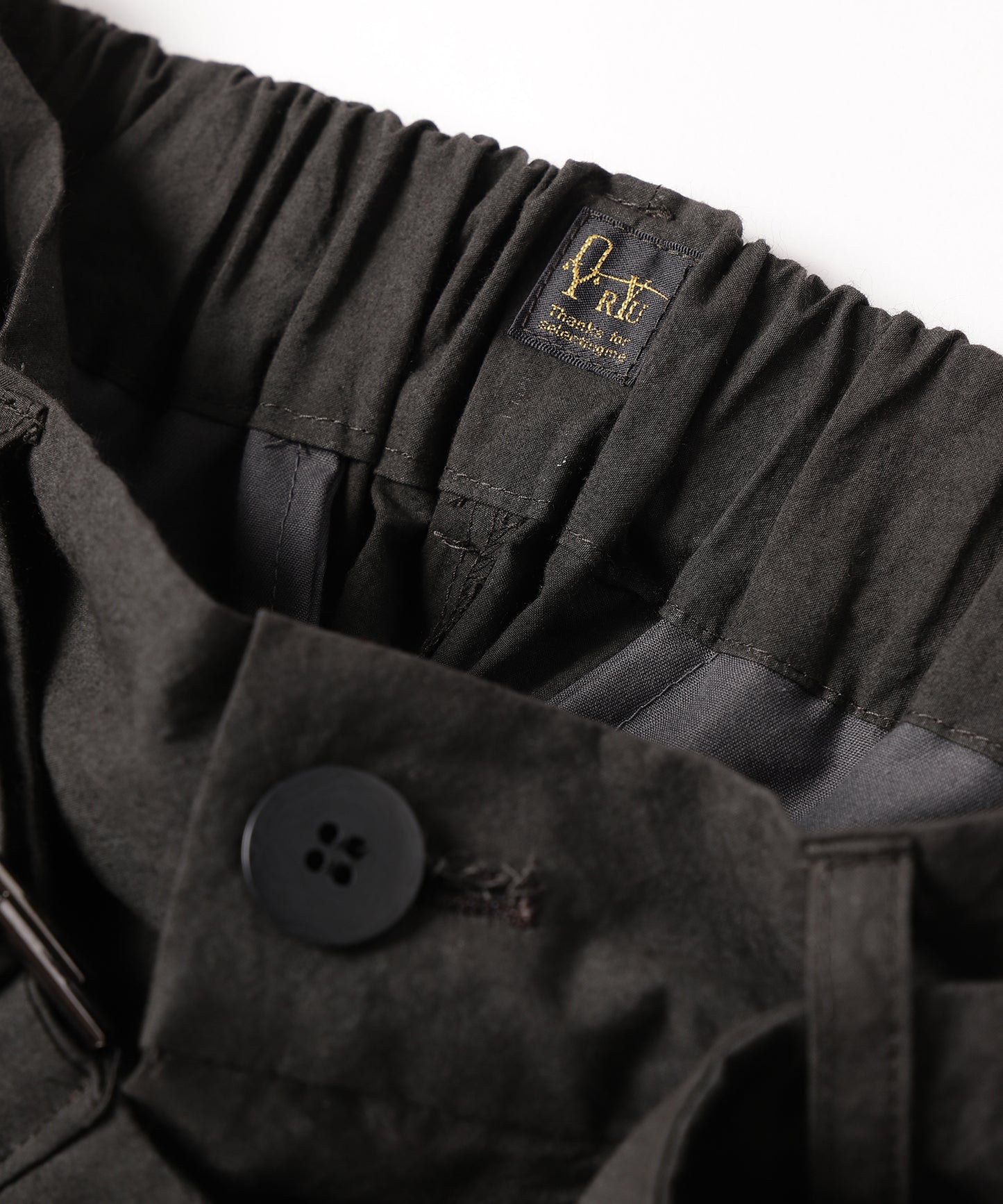 dump two-tuck slacks with belt