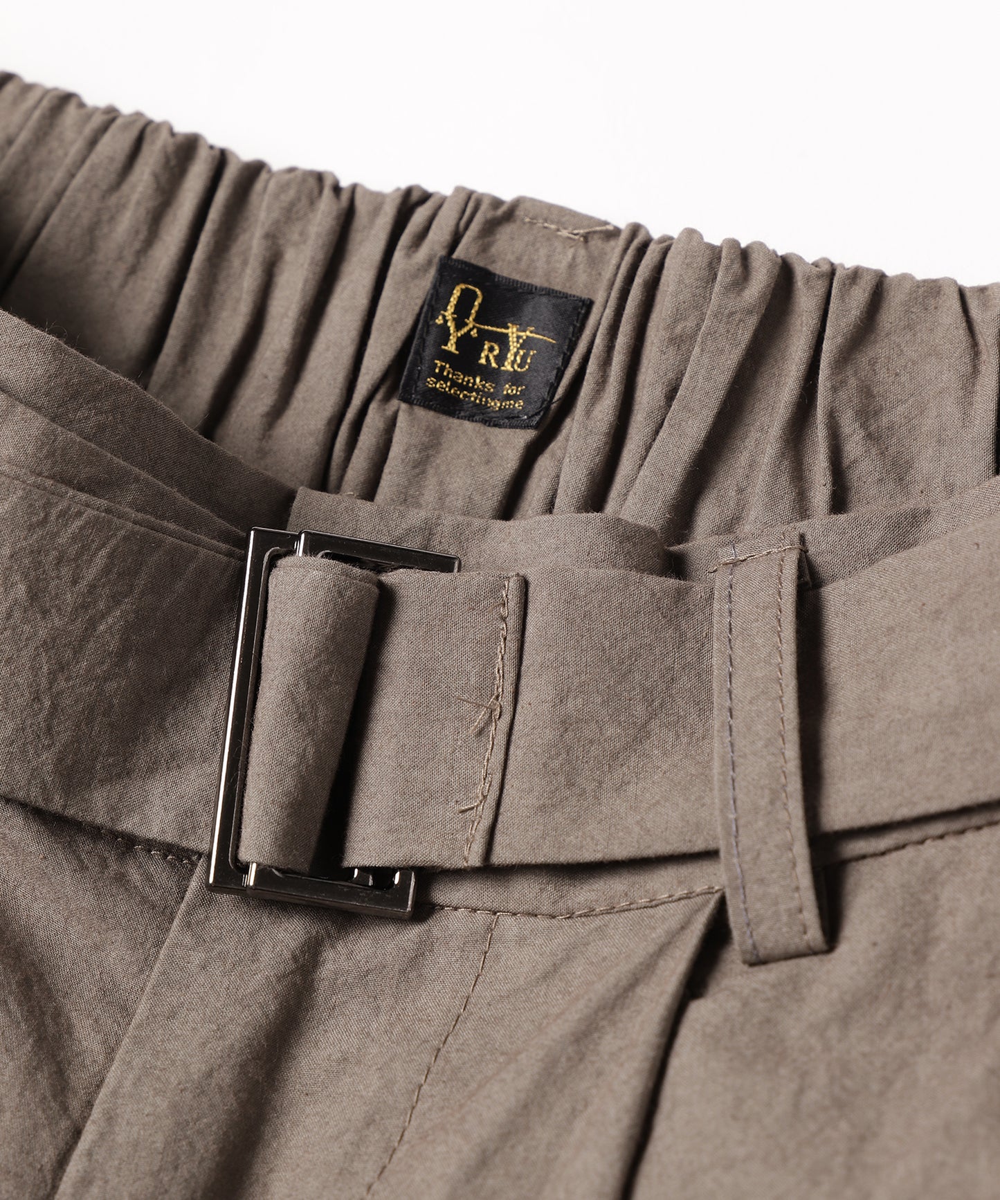 dump two-tuck slacks with belt