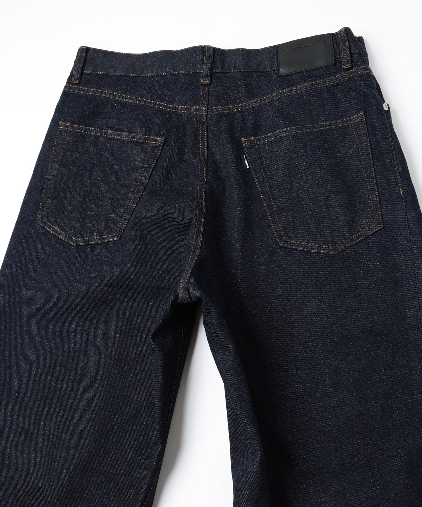 TWIST DENIM PANTS