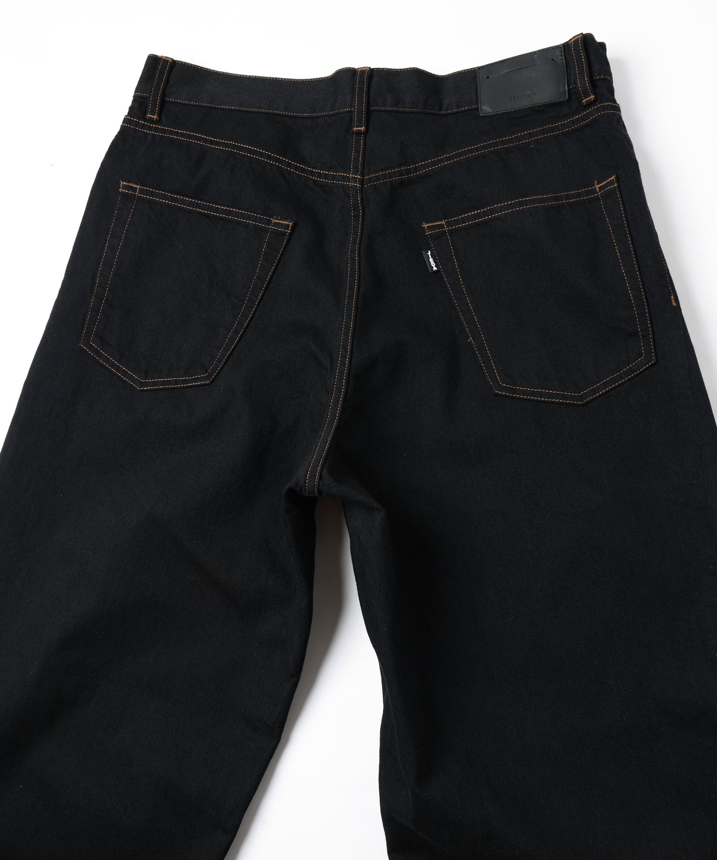TWIST DENIM PANTS