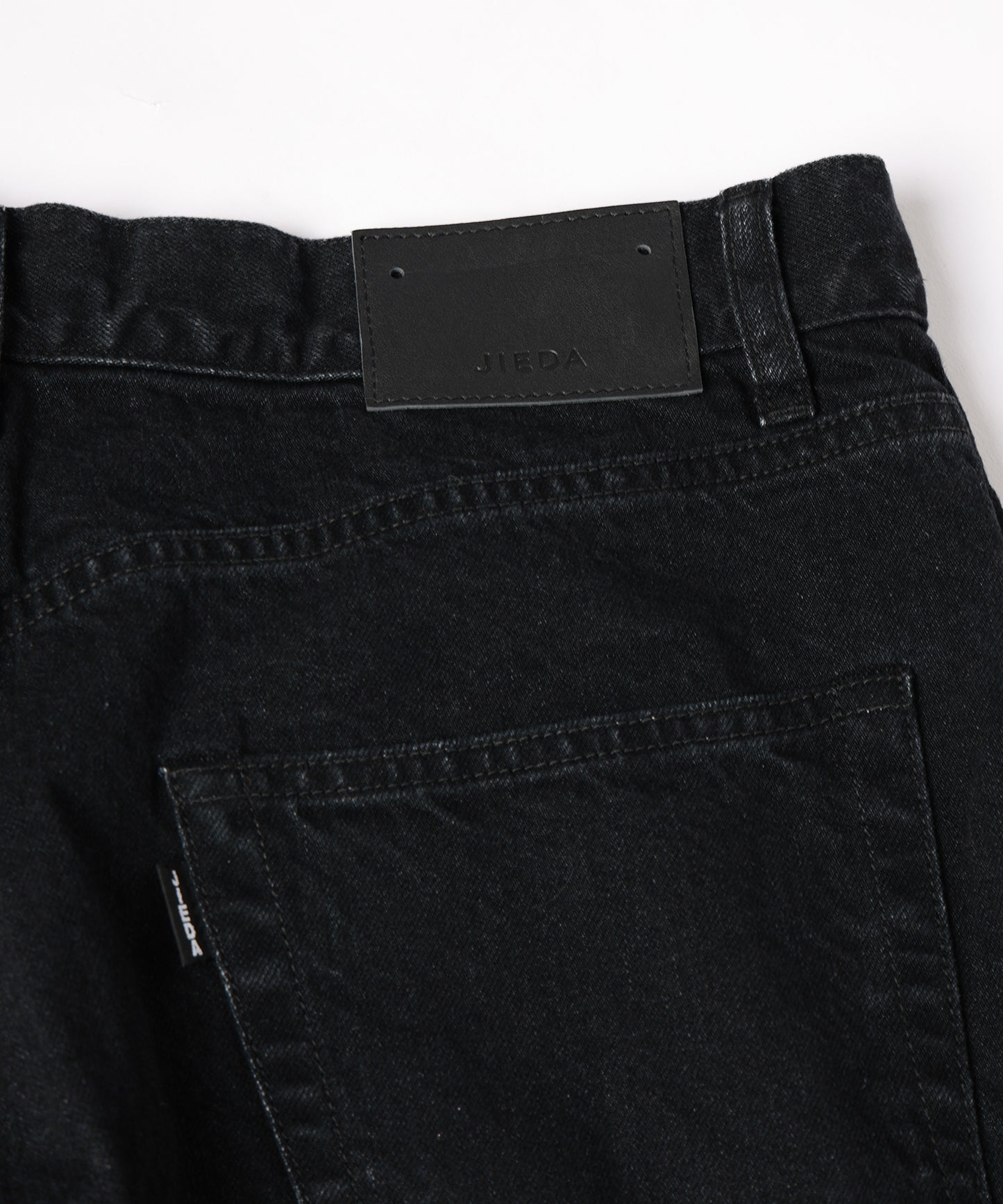 KNEE HIGH LAYERED COATED DENIM